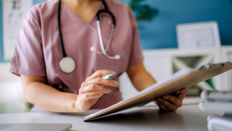 Close up shot of female nurse working at doctor’s office